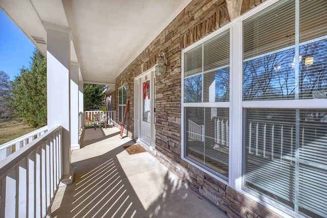 balcony featuring a porch