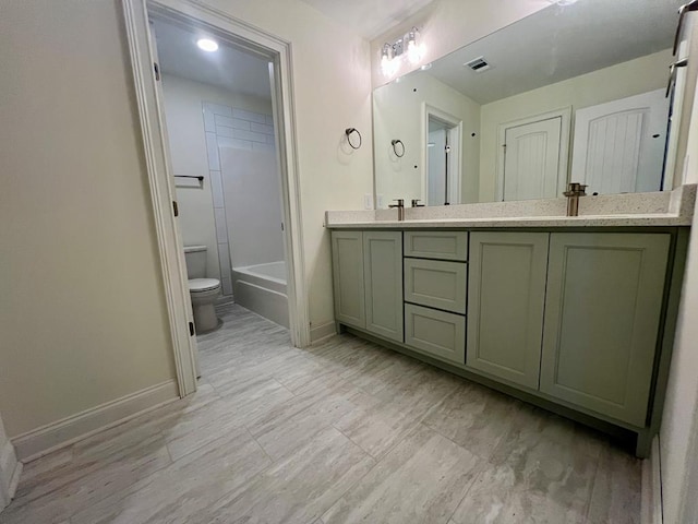 full bathroom featuring vanity, toilet, and shower / bath combination