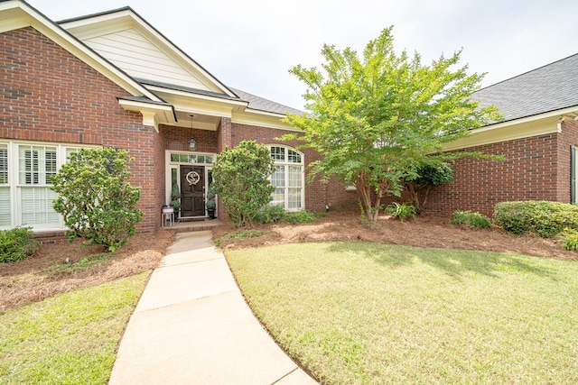 8039 Adelaide Dr, Columbus, GA 31909 - property entrance featuring a lawn and brick siding
