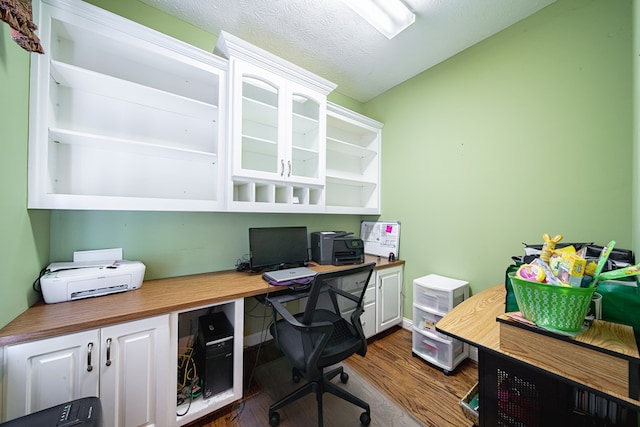 8039 Adelaide Dr, Columbus, GA 31909 - office area featuring dark wood-style floors and a textured ceiling