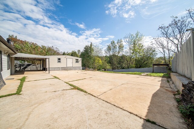 view of patio / terrace featuring a carport