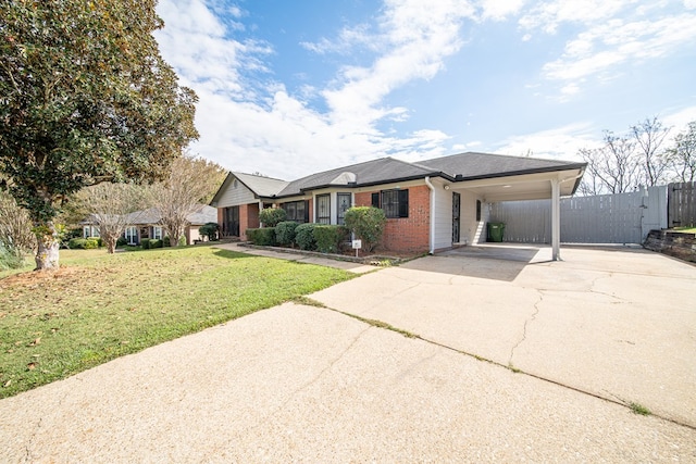 single story home featuring a front yard and a carport