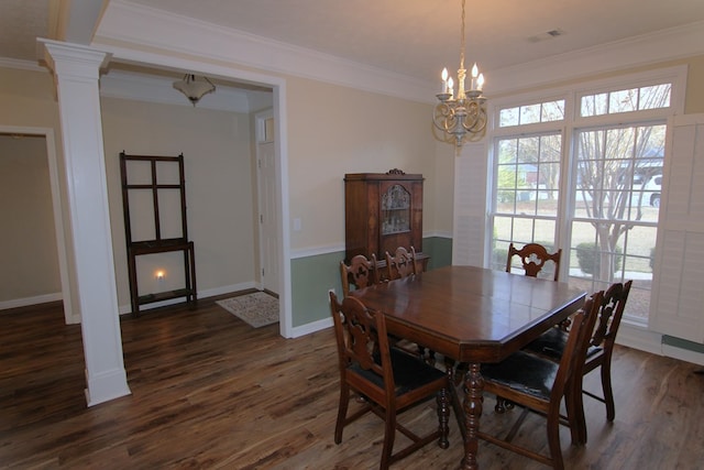 dining space featuring decorative columns, visible vents, dark wood-style flooring, and crown molding