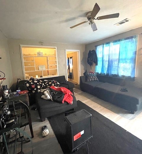 living room with ceiling fan