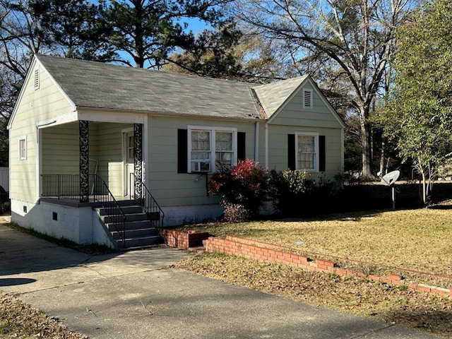 bungalow with a front lawn