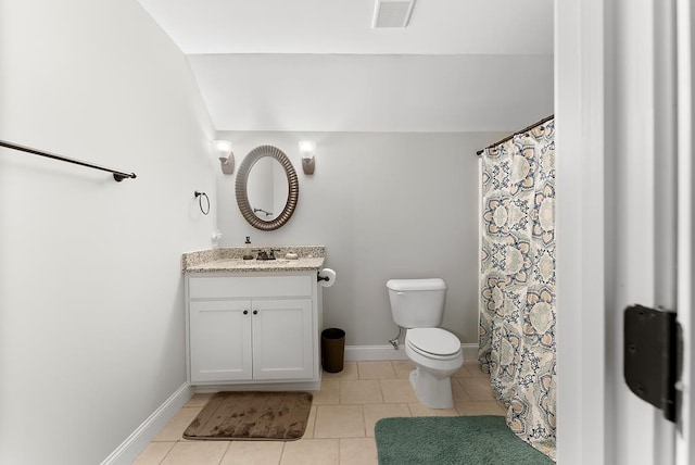 bathroom with visible vents, toilet, vanity, baseboards, and tile patterned floors