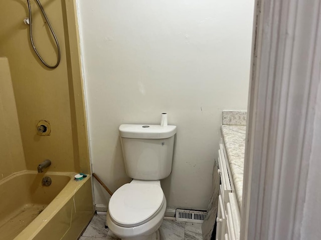 bathroom with visible vents, toilet, vanity, marble finish floor, and shower / bathtub combination