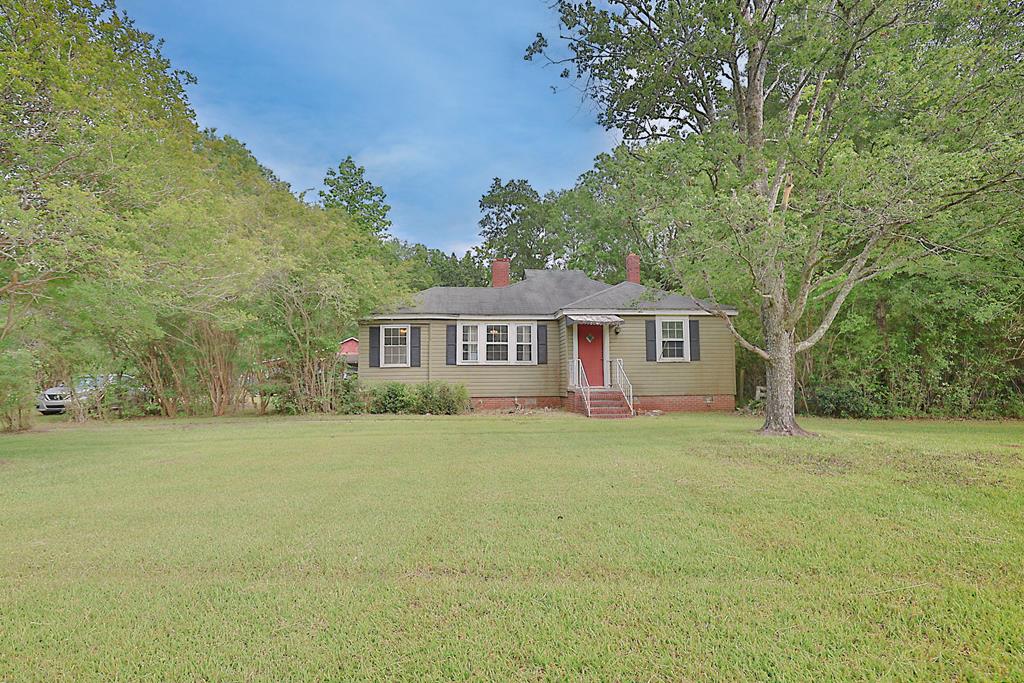 8282 Ga Highway 0085, Waverly Hall, GA 31831 - single story home featuring a chimney, a front lawn, and entry steps