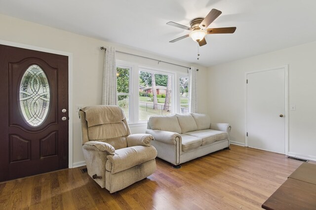 2608 5th Ave, Phenix City, AL 36867 - living area featuring a ceiling fan, light wood-type flooring, and baseboards