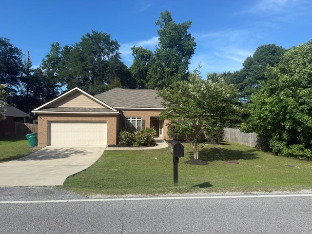 1170 Railroad Ave, Smiths Station, AL 36877 - view of front of property featuring an attached garage, concrete driveway, and brick siding