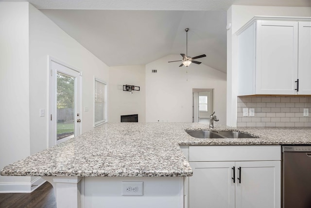 1170 Railroad Ave, Smiths Station, AL 36877 - kitchen featuring a sink, stainless steel dishwasher, dark wood finished floors, ceiling fan, and white cabinetry