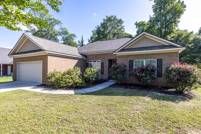 1170 Railroad Ave, Smiths Station, AL 36877 - single story home with brick siding, a front lawn, an attached garage, and concrete driveway