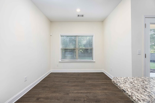 1170 Railroad Ave, Smiths Station, AL 36877 - empty room with dark wood-style flooring and baseboards