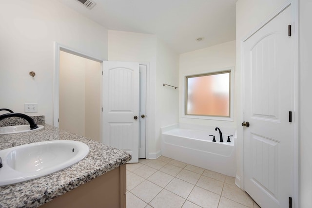 1170 Railroad Ave, Smiths Station, AL 36877 - full bathroom featuring double vanity, a bath, and tile patterned floors