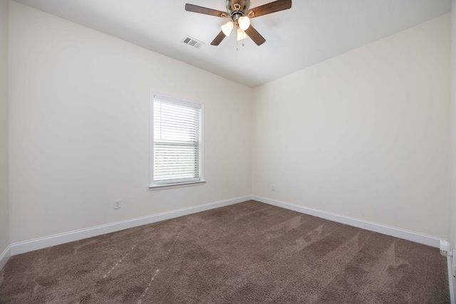 1170 Railroad Ave, Smiths Station, AL 36877 - carpeted empty room with baseboards and ceiling fan