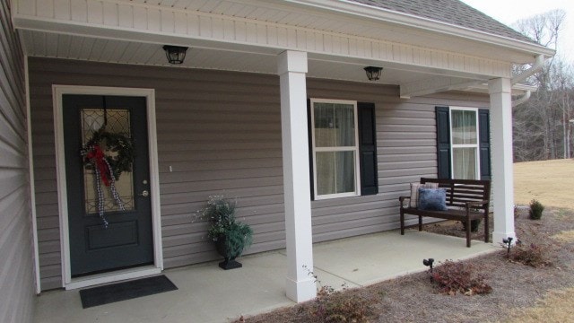 entrance to property with covered porch