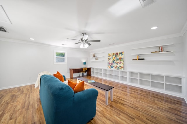 3796 Auburn Rd, Phenix City, AL 36870 - living room with ornamental molding, wood finished floors, ceiling fan, built in shelves, and recessed lighting