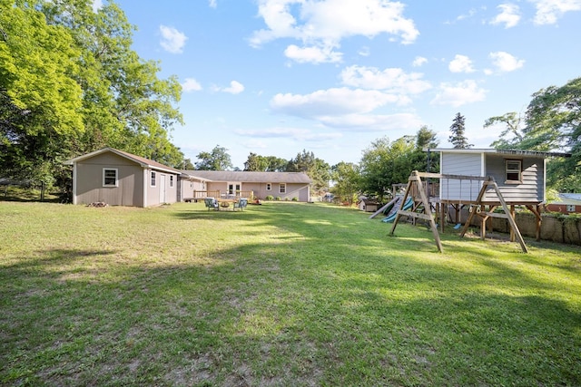 3796 Auburn Rd, Phenix City, AL 36870 - view of yard with a playground and an outdoor structure