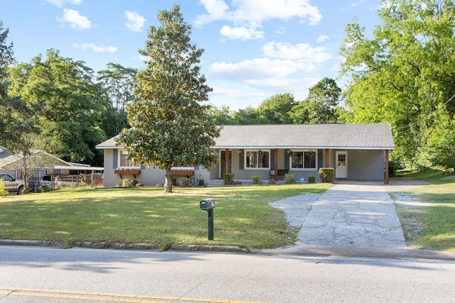 3796 Auburn Rd, Phenix City, AL 36870 - ranch-style house featuring an attached carport, concrete driveway, and a front lawn