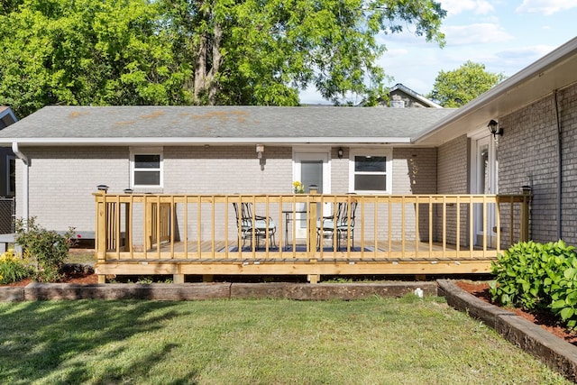 3796 Auburn Rd, Phenix City, AL 36870 - rear view of house with roof with shingles, a lawn, and brick siding