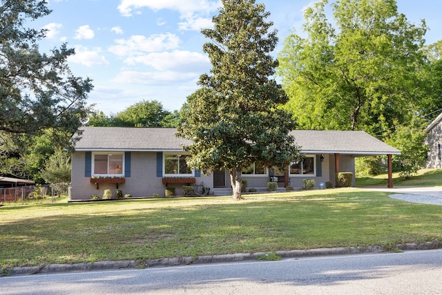 3796 Auburn Rd, Phenix City, AL 36870 - ranch-style home featuring an attached carport, driveway, brick siding, and a front yard