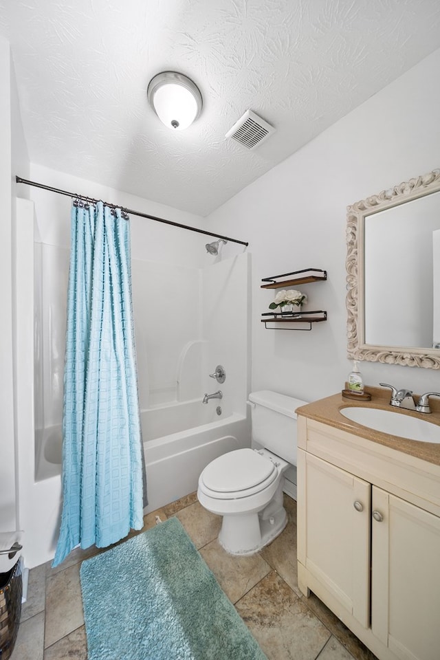 3796 Auburn Rd, Phenix City, AL 36870 - bathroom with vanity, shower / tub combo with curtain, a textured ceiling, and stone finish flooring