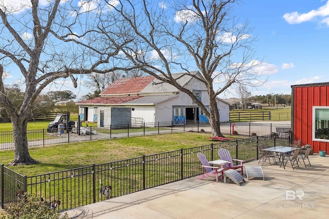 view of patio featuring fence