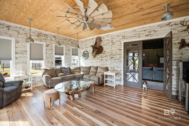 living room featuring wood ceiling, visible vents, ceiling fan, and wood finished floors