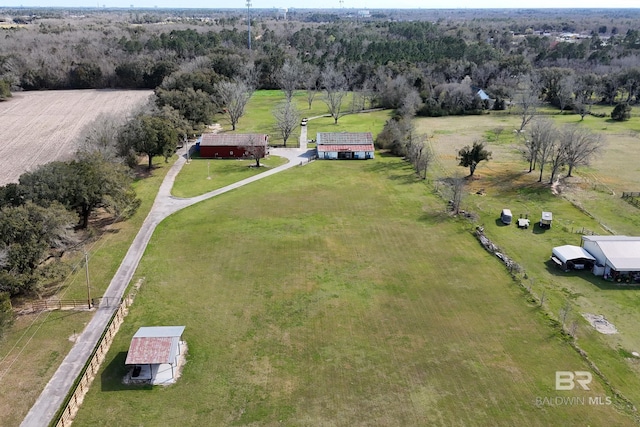 birds eye view of property with a rural view