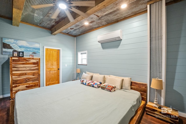 bedroom with beam ceiling, a wall mounted air conditioner, and ceiling fan