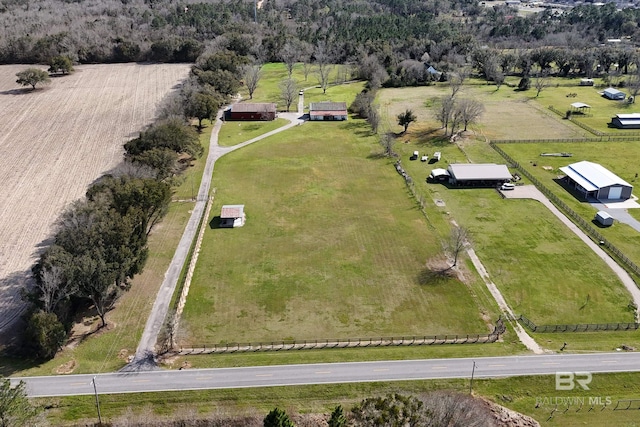 birds eye view of property featuring a rural view