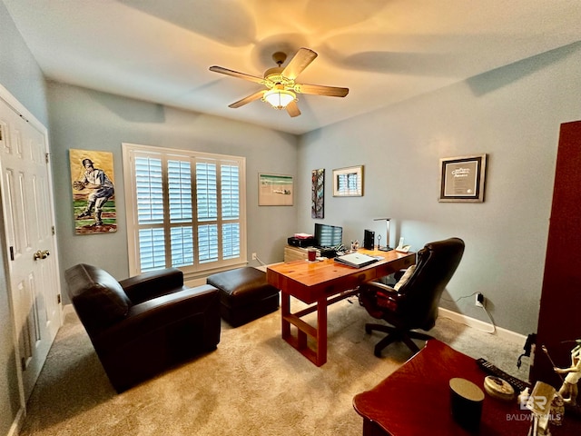 carpeted office with ceiling fan