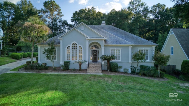 view of front of home with a front yard