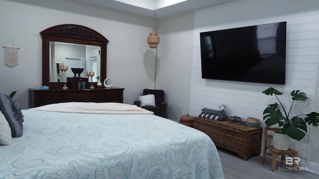 bedroom featuring light wood-type flooring