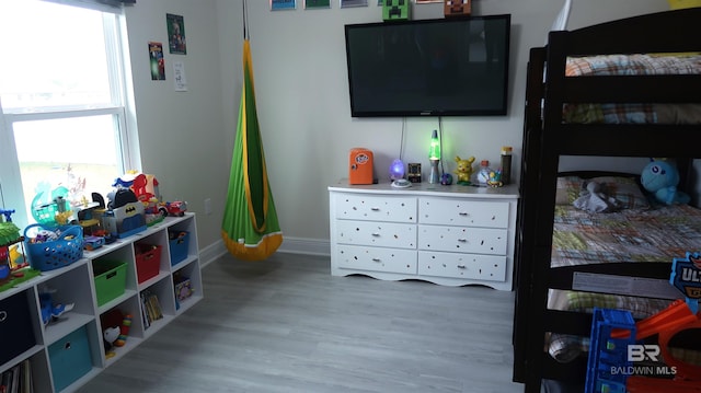 bedroom featuring hardwood / wood-style flooring