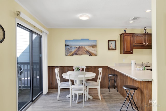 dining area featuring light hardwood / wood-style flooring