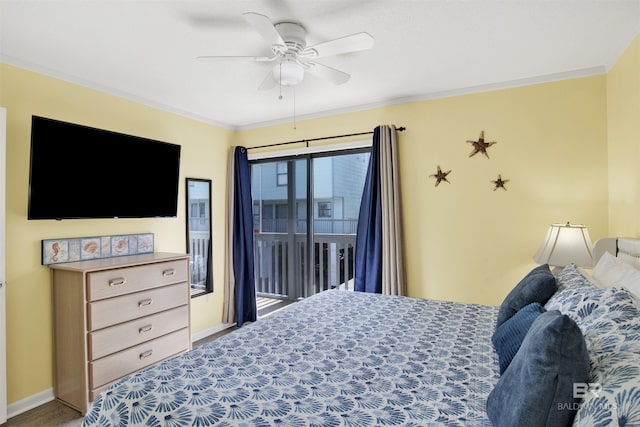 bedroom featuring crown molding, access to exterior, and ceiling fan