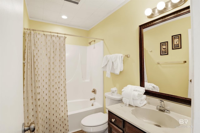 full bathroom featuring crown molding, vanity, toilet, and shower / tub combo