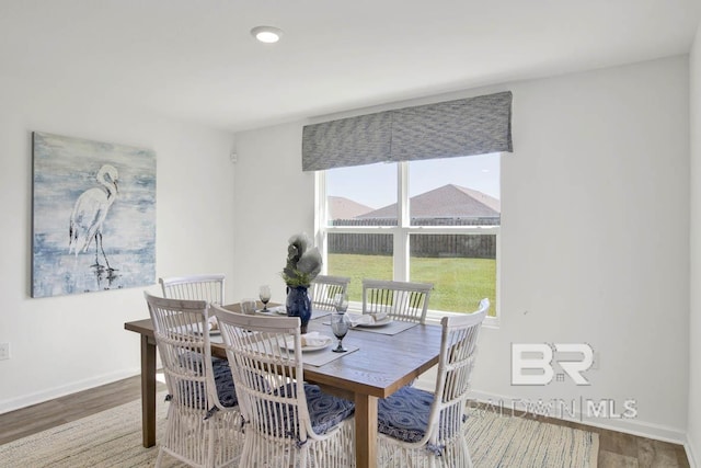 14304 State Highway 104, Silverhill, AL 36576 - dining area featuring wood finished floors and baseboards
