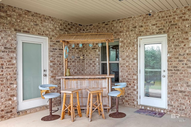 view of patio / terrace featuring exterior bar