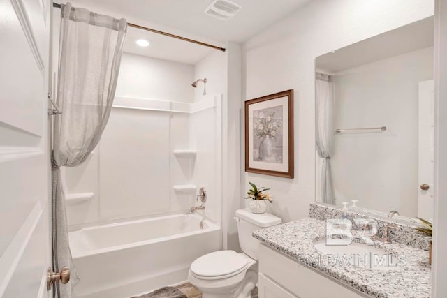 full bathroom featuring bathtub / shower combination, vanity, and toilet