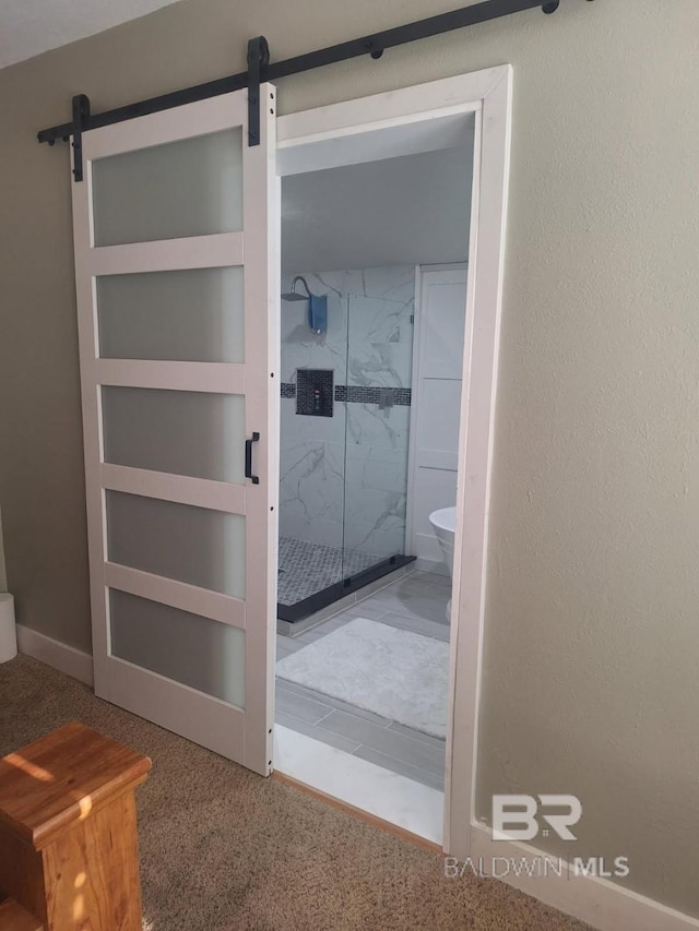 full bathroom featuring a marble finish shower