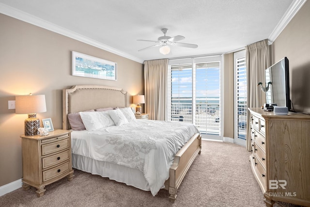 bedroom with baseboards, light carpet, ornamental molding, and access to exterior