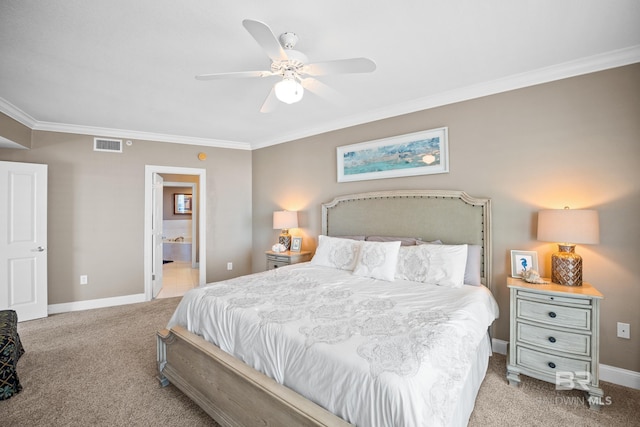 bedroom with visible vents, light colored carpet, baseboards, and ornamental molding