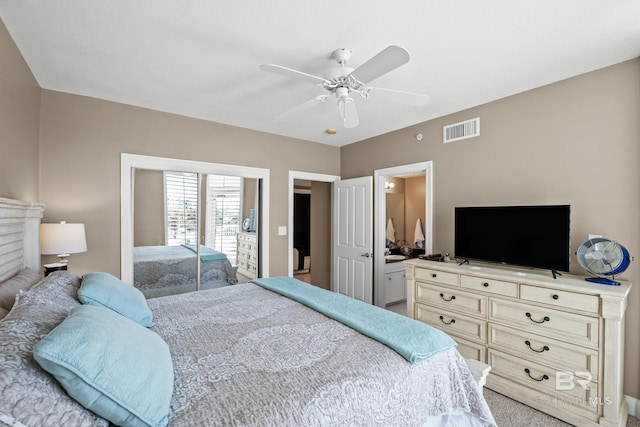 bedroom featuring carpet, visible vents, and ceiling fan