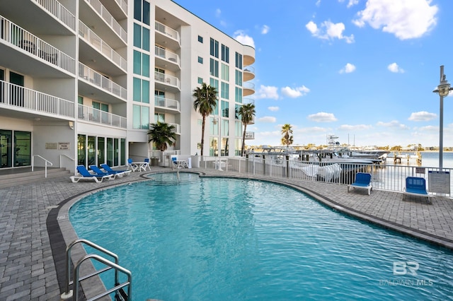 pool with a patio