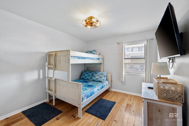 bedroom with light hardwood / wood-style floors