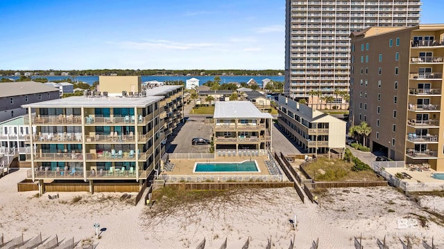 birds eye view of property with a water view