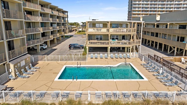 view of swimming pool with a patio area