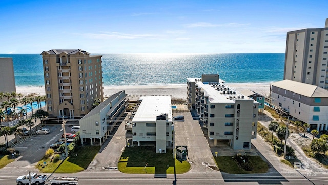 aerial view with a beach view and a water view